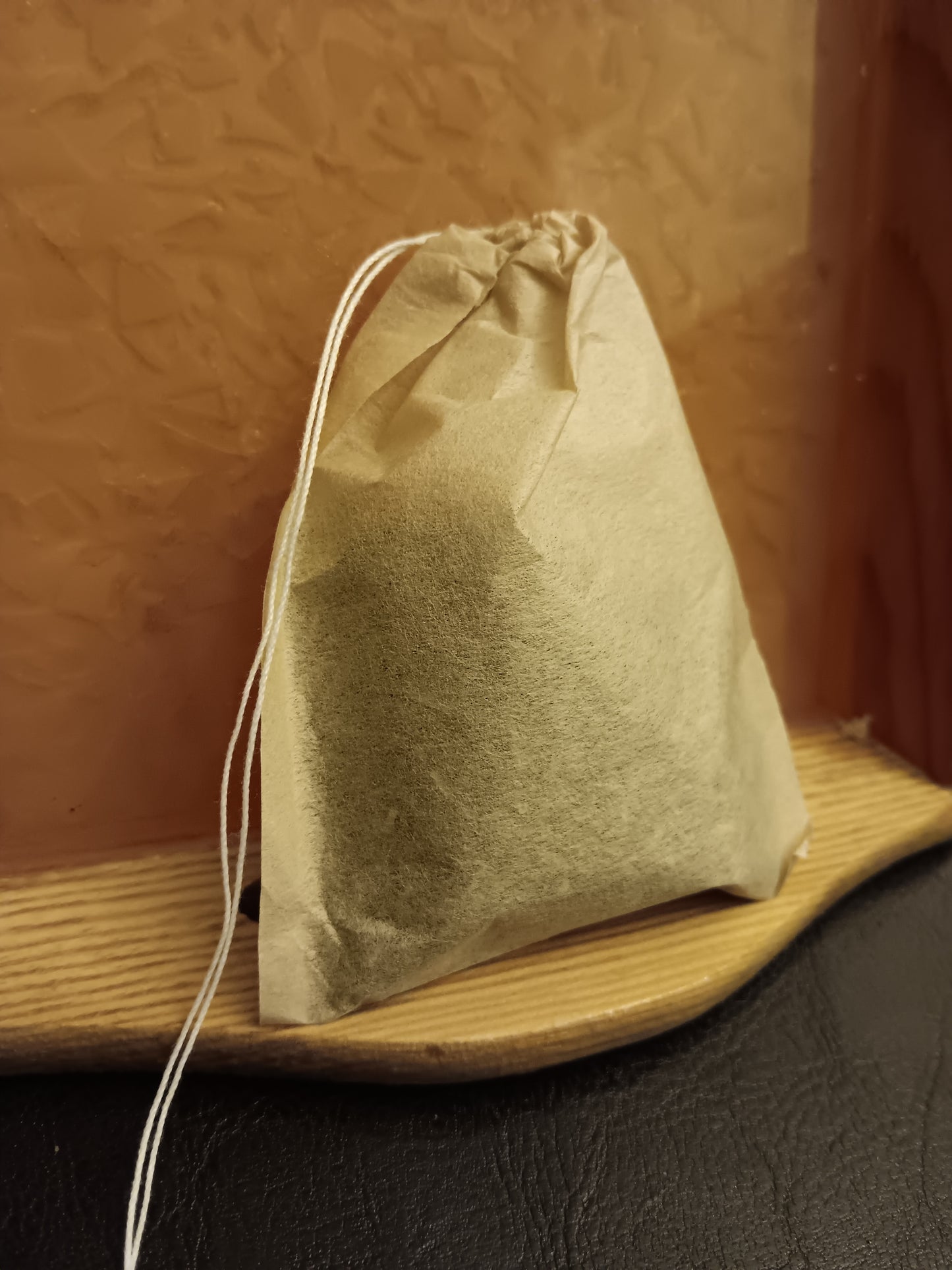 Organic catnip teabags/catnip toy refills for cats, image of single teabag/refill pouch